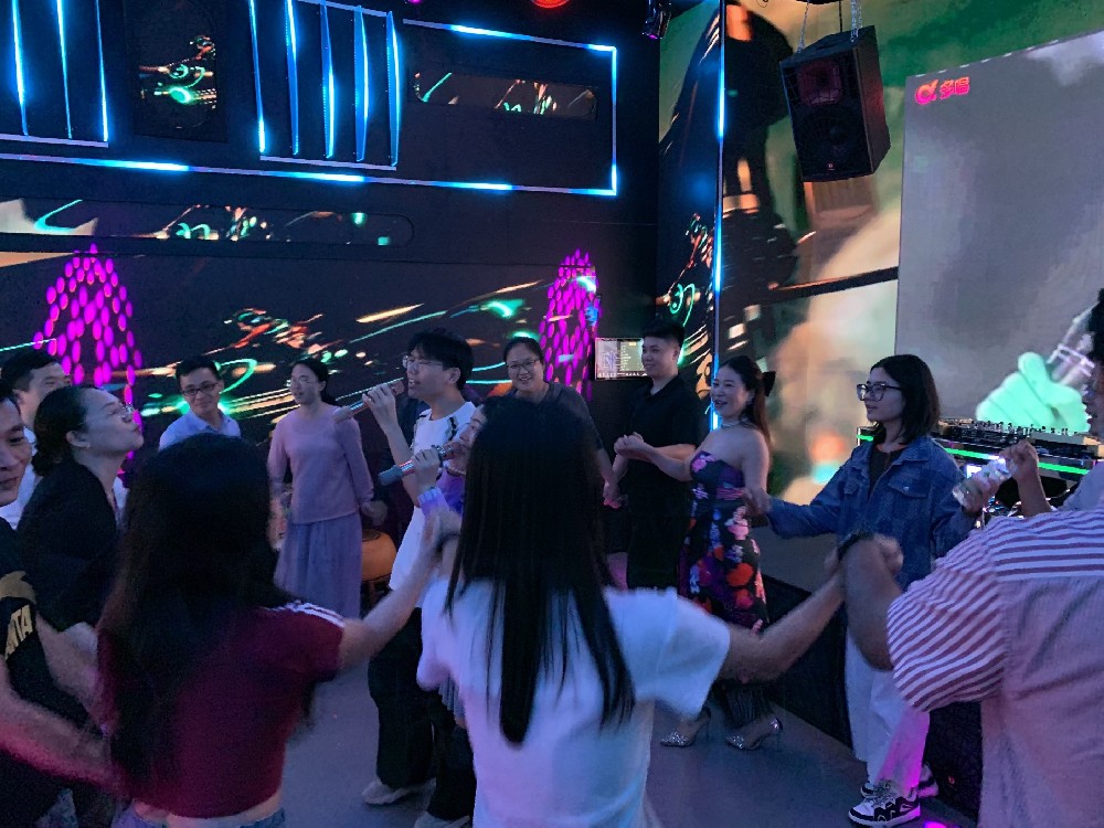 T.I Group's Singing Celebration:Audio, Lighting & LED Transform Corporate Fun into Sensory Spectacle